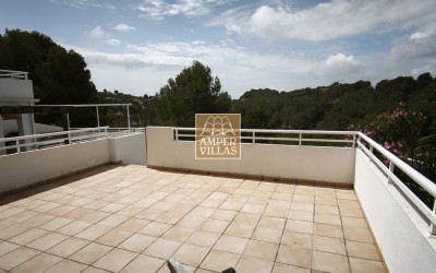 A sunny apartment with lovely wide views and a large terrace.